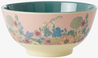 Foto av vacker skål med blomstermotiv och grön insida