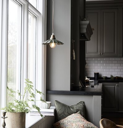Bild av ett mysigt kök med harmonisk inredning