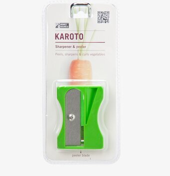 Bild av innovativ grön köksgadget i detaljrik förpackning