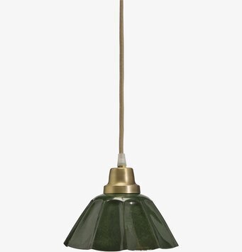 Bild av elegant mörkgrön fönsterlampa med mässingdetalj