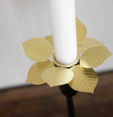 Bild av elegant ljusmanchett med naturinspirerad design