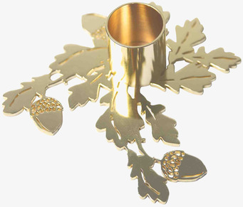 Bild av stilren ljusstake i guldfärgad metall