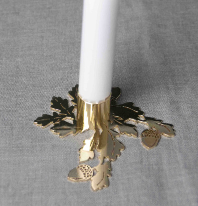 Foto av elegant ljusstake med naturinspirerad design