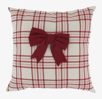 Foto av kuddfodral med rutigt mönster och rosett