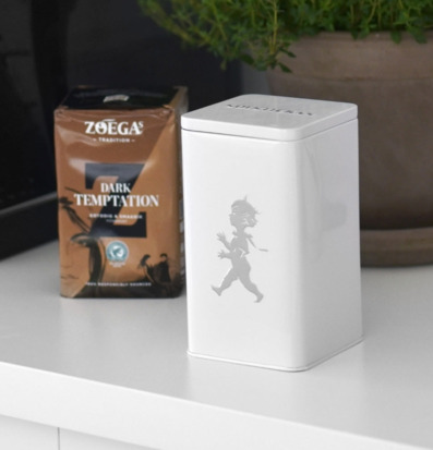 Bild av stilren plåtburk för kaffe med designfokus