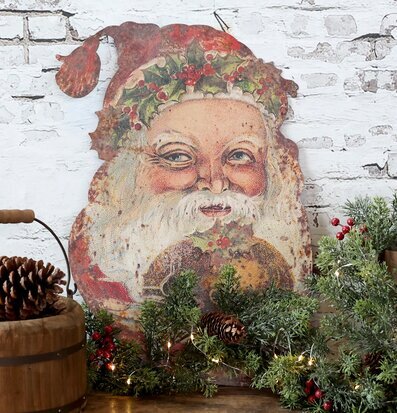 Bild av jultomte på vintage plåtskylt med juldekorationer