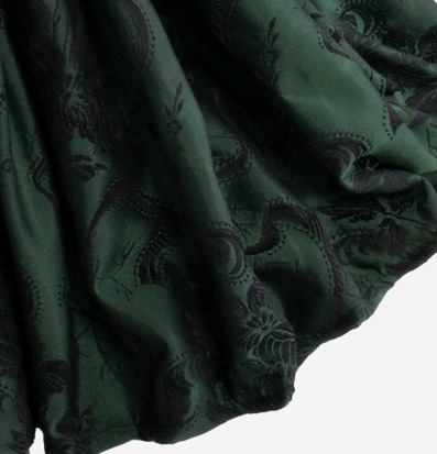 Bild av vackert tyg med intrikat design och textur