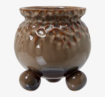 Bild av elegant brunmelerad kruka med unik design