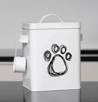 Bild av stilren och funktionell plåtburk med tassmotiv