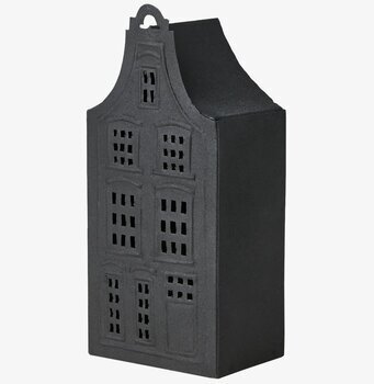 Foto av dekorativ ljuslykta med husdesign i svart