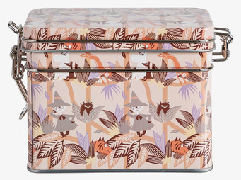 Bild av teburk med Mumin-design och varm färgpalett