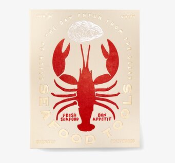 Bild av stilren förpackning med maritimt tema och hummer