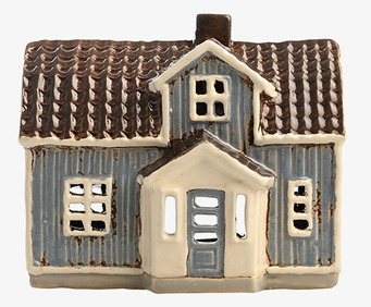 Foto av en hemtrevlig ljuslykta i form av ett hus