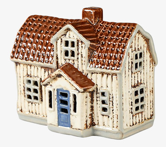 Bild av dekorativ ljuslykta i form av ett charmigt hus