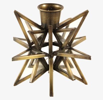 Bild av en antik ljushållare med stjärnformad design