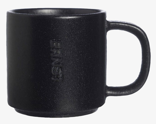 Bild av stilren svart mugg med modern och traditionell design