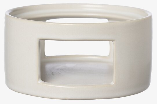 Foto av elegant keramisk glöggkanna-värmare i vitt