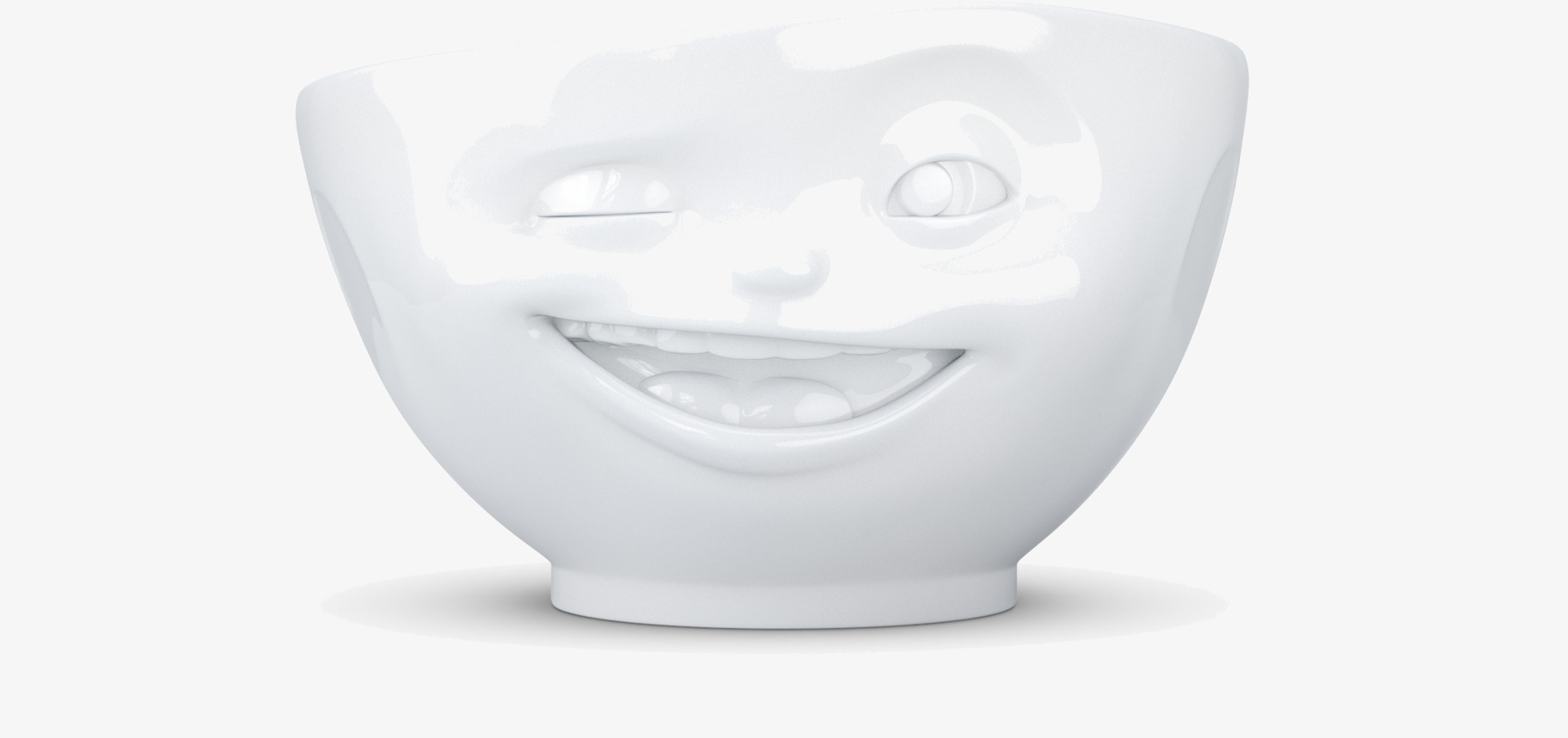 Bild på porslinsskål med lekfullt ansikte och tidlös design