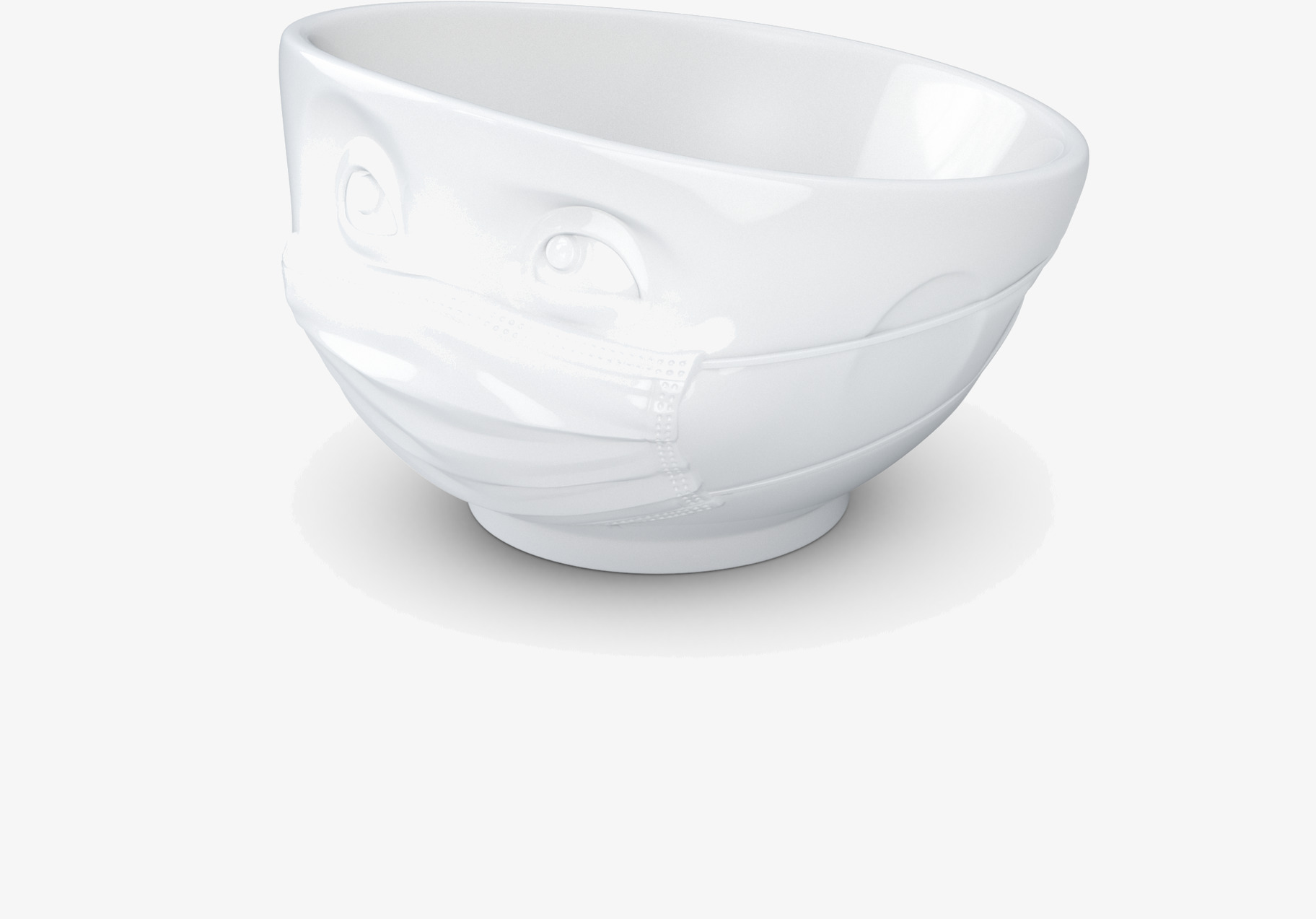 Bild av humoristisk porslinsskål med ansikte och munskydd