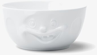 Bild av stor porslinsskål med lekfull design och leende