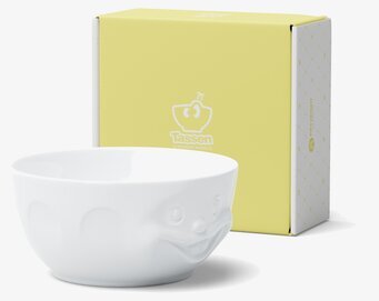 Foto av unik porslinsskål med ansiktsdesign i vitt