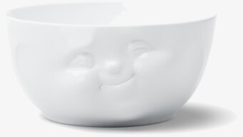 Foto av stor porslinsskål med lekfull ansiktsdesign