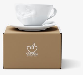 Bild av lekfullt designad kaffekopp med fat i porslin