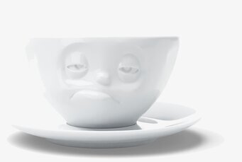 Bild av unik kaffekopp med fat och skulpturalt ansikte