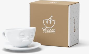 Bild på unik kaffekopp med lekfullt ansiktsuttryck