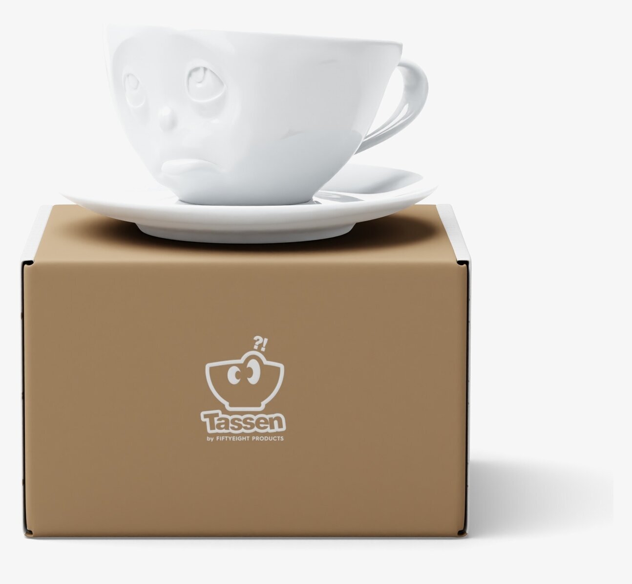 Bild av unik kaffekopp med ansikte och fat i porslin