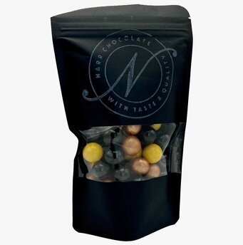 Bild av elegant lakritsförpackning med genomskinlig del