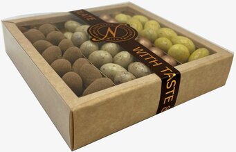 Bild av stilfull chokladask med fyra unika smaker