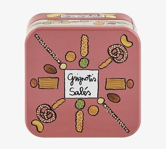 Bild av röd plåtburk med kex och kringlor i elegant design