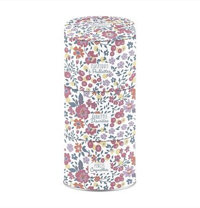 Bild av färgglad plåtburk för håraccessoarer hemma