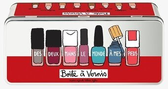 Bild av färgglad plåtburk med nagellacksdesign