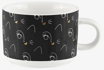 Bild av elegant tekopp med konstnärligt mönster och detaljer