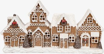 Bild av charmigt pepparkakshus med festlig julstämning