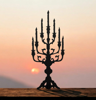 Bild av elegant kandelaber mot solnedgångens färger