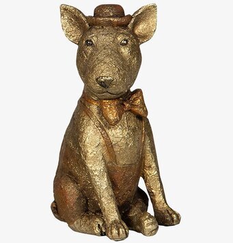 Bild av gyllene hundfigur i cirkustema med hatt och fluga