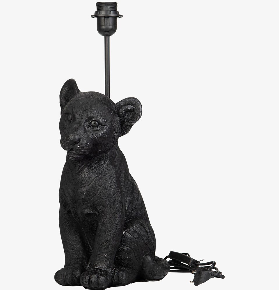 Foto av unik lampfot med lejonunge i detaljrik design