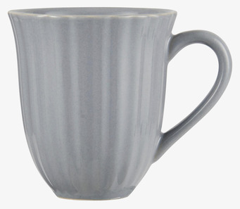 Bild av stilren mugg i tidlös grå nyans och elegant form