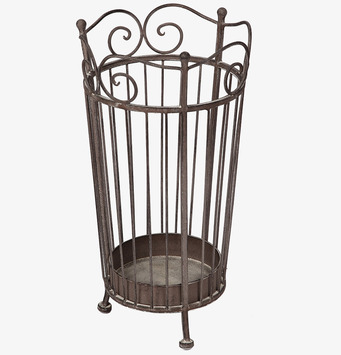 Foto av antikt paraplyställ med konstnärlig design