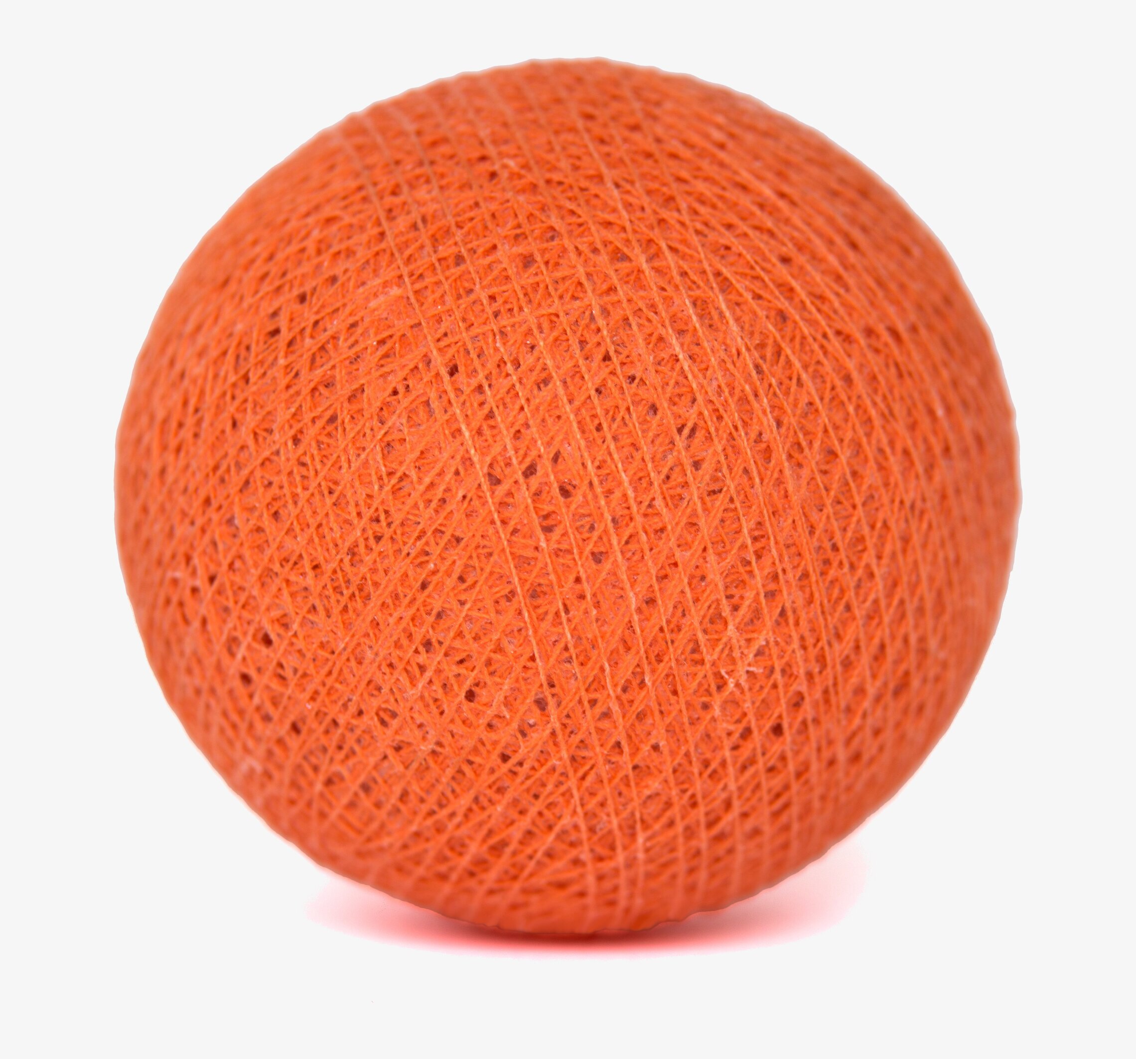 Bild av livfull korallfärgad boll med unik textur