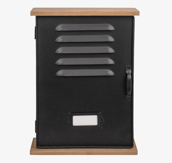 Bild av stilrent nyckelskåp i svart och naturtoner