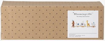 Bild av kartonglåda med födelsedagståg och stjärnmönster