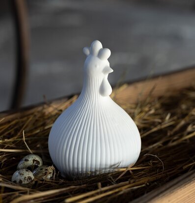 Bild av dekorativ keramikfigur med lantlig känsla