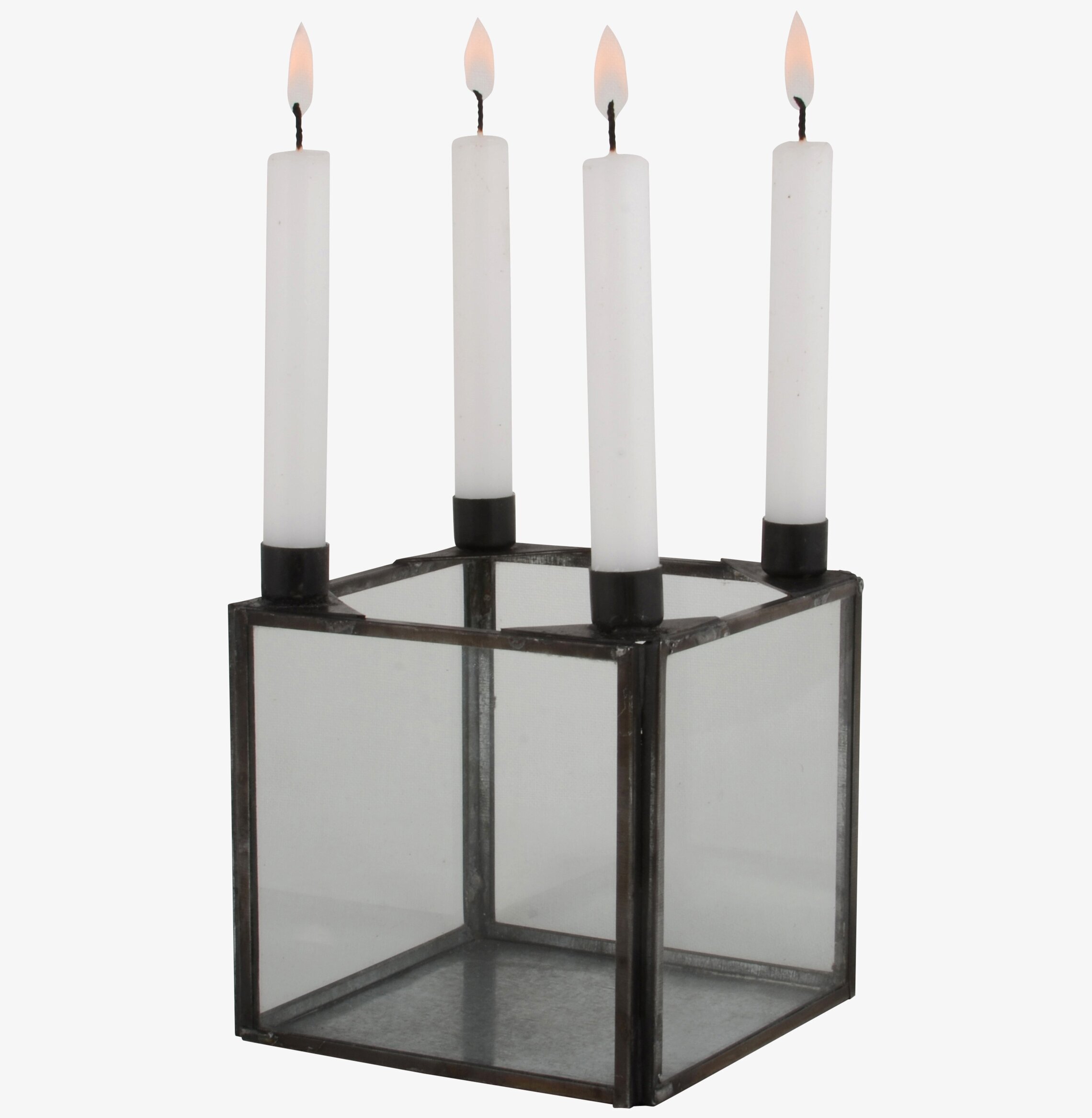 Foto av stilren ljusstake i glas och metall för hemmet