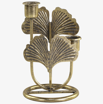 Foto av elegant ljusstake med antik mässingsfinish