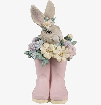 Bild av charmig kaninfigur i rosa stövlar och blommor