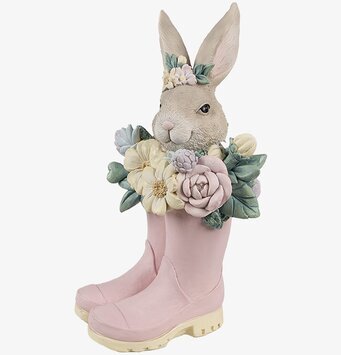 Bild av charmig kaninfigur med blommor och stövlar